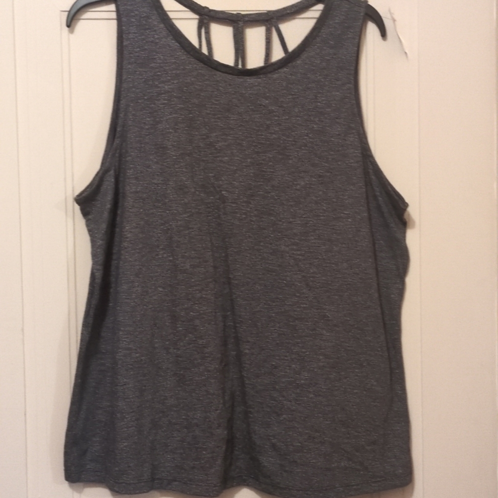 Sleeveless crisscross top. Grey new with tags